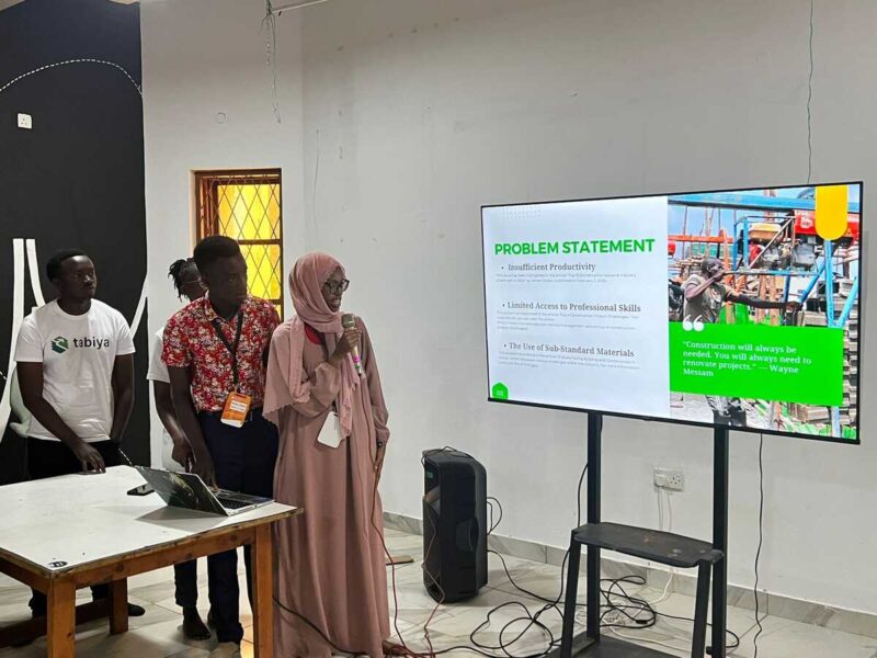 Team presents a problem statement slide during a pitch session.